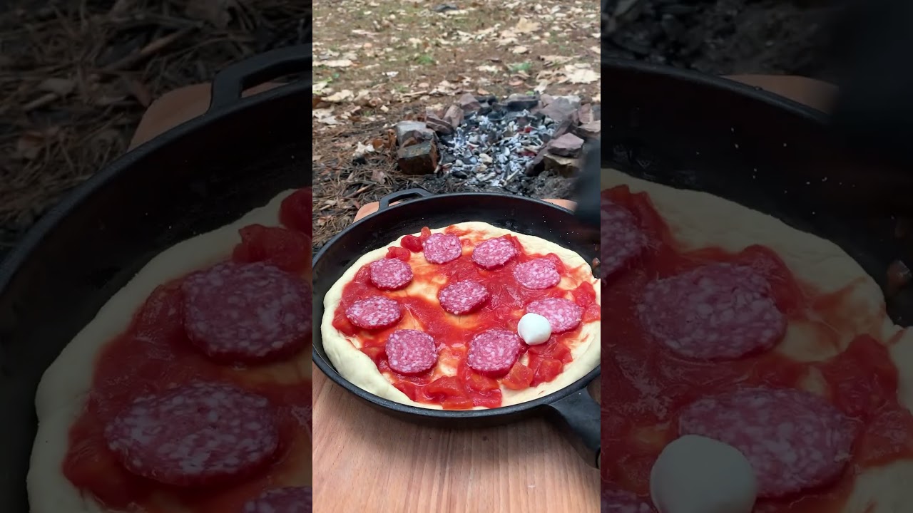 🔥 Pizza over an open fire in the woods!🍕🔥#PizzaOnFire #OutdoorCooking #CastIron #Pizza