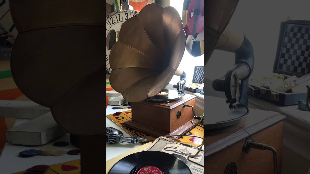 Johnny Cash & The Tennessee Two “Big River” 78 rpm record on  Fraad Phonigraph