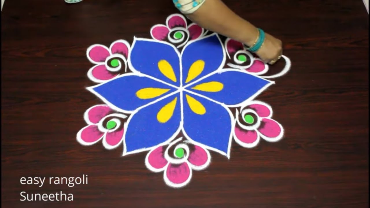 Amazing Freehand rangoli kolam for Sankranthi festival 2020 by easy rangoli Suneetha