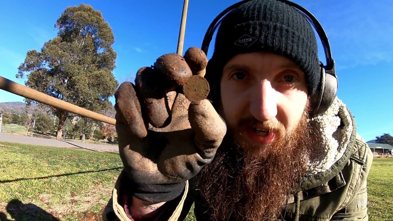 Digging up Money and Silver Metal Detecting.
