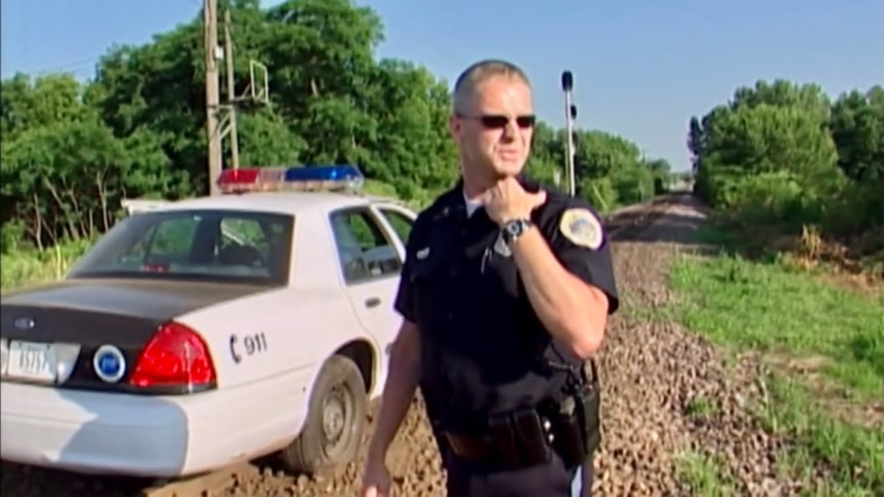 Cops Tv show Des Moines Iowa. Police car stuck on train tracks. Season 16. “Ohhh no”!!!! (2004).