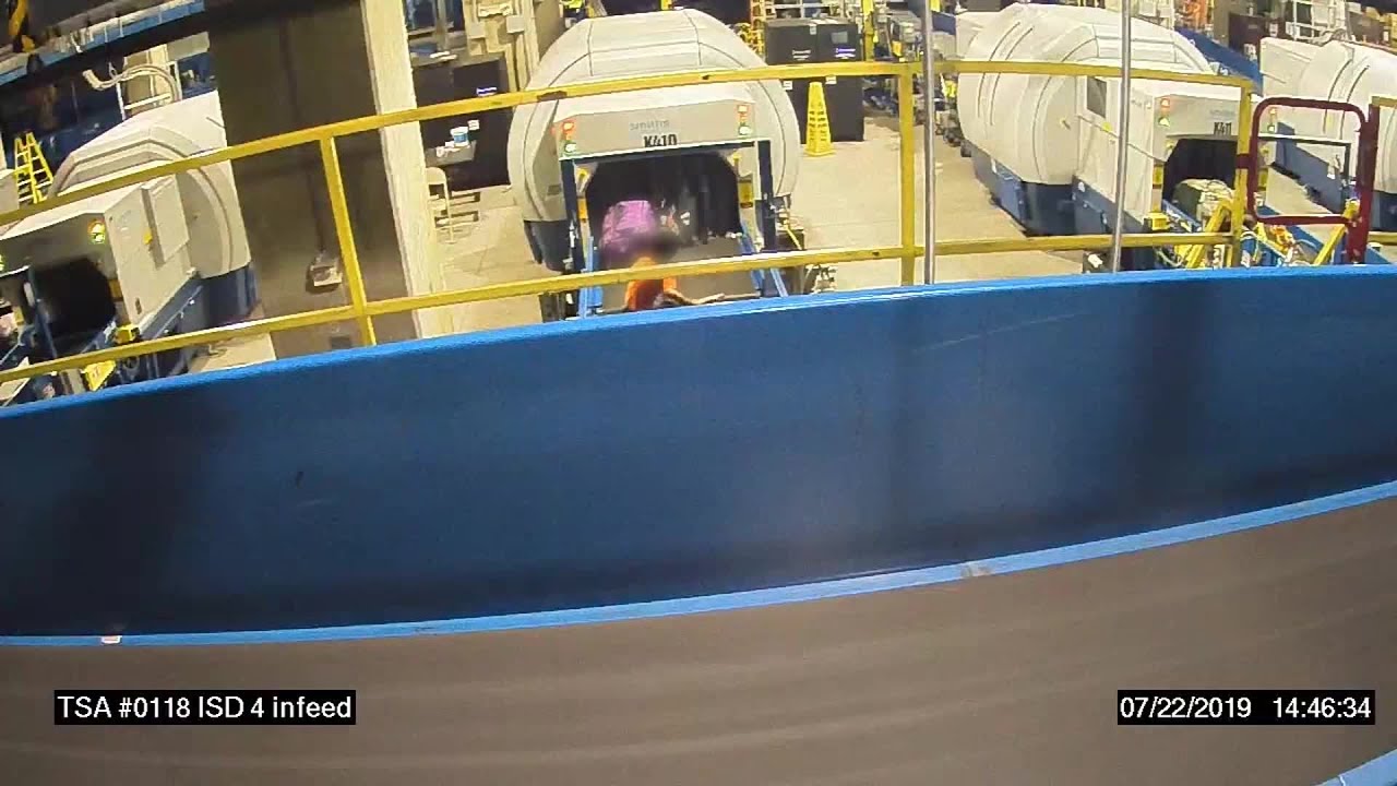 Boy takes ride on GA airport conveyor belt