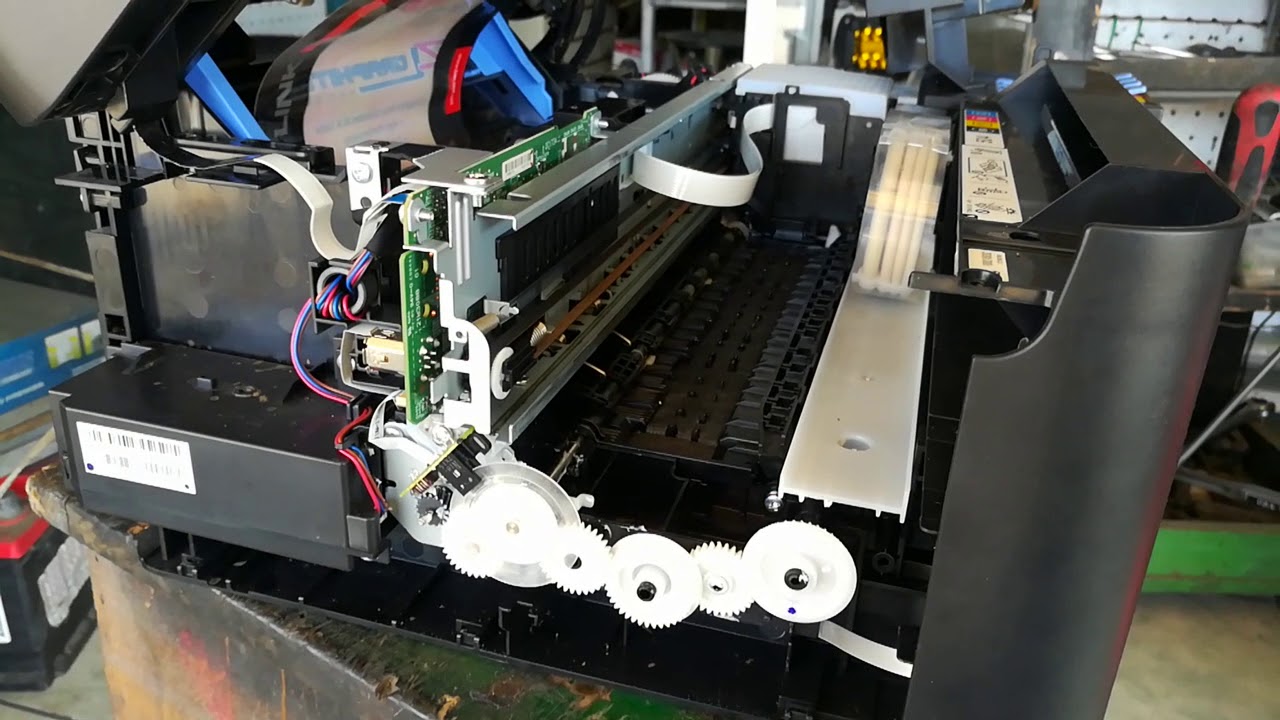 Epson L4150 all LEDs flashing grease and piece of metal in paper feed slot
