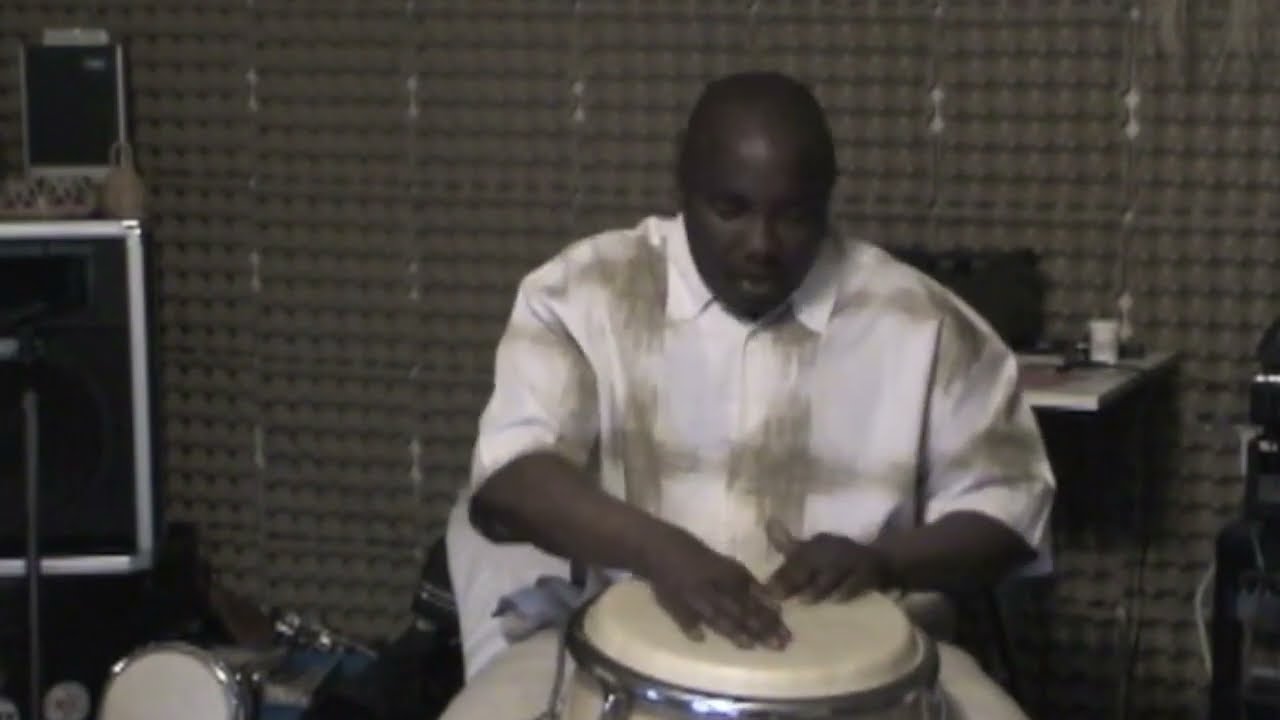 Guiro: Caja (drum) with Israel 