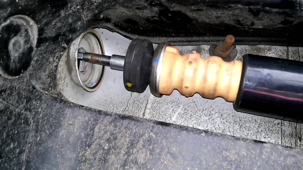 como cambiar amortiguador posterior