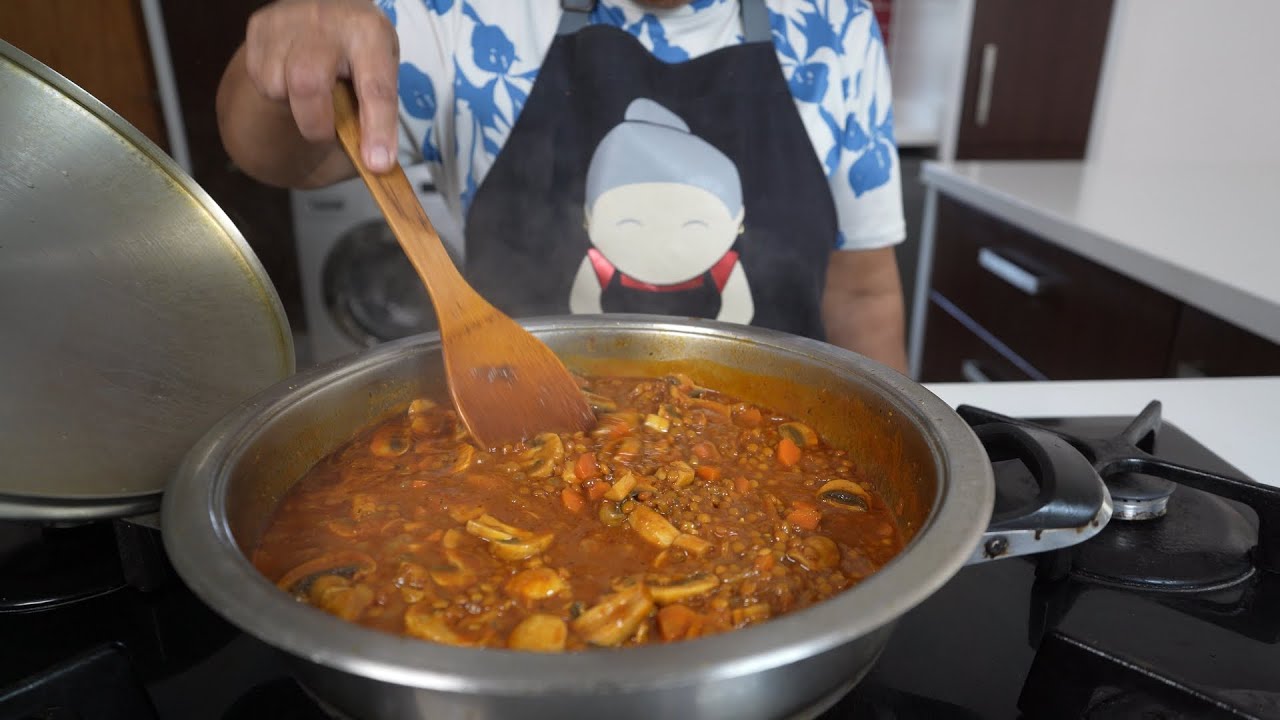 Making a brown lentil and vegetable pie - hearty vegetarian alternative filling for pies
