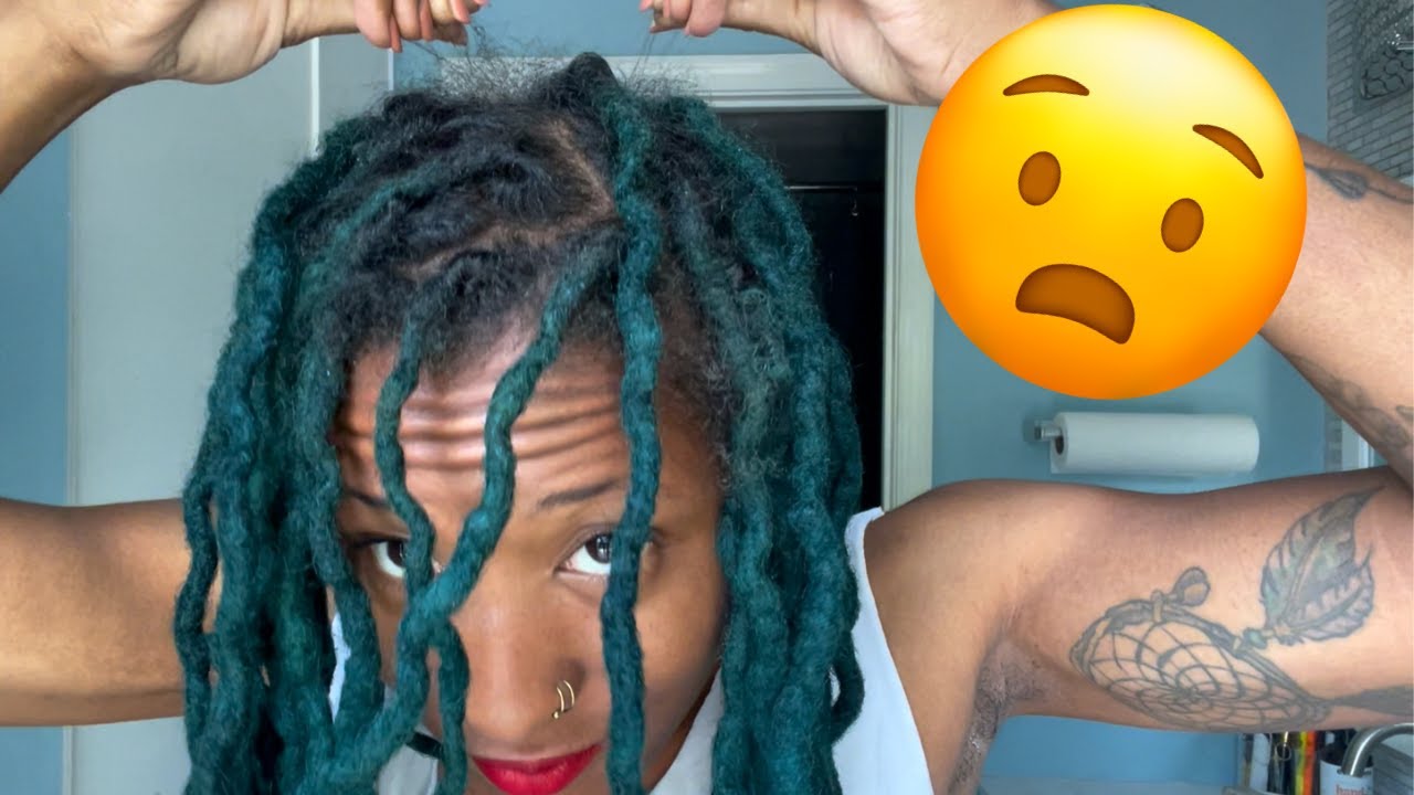 The hair is growing AWAY from my locs!