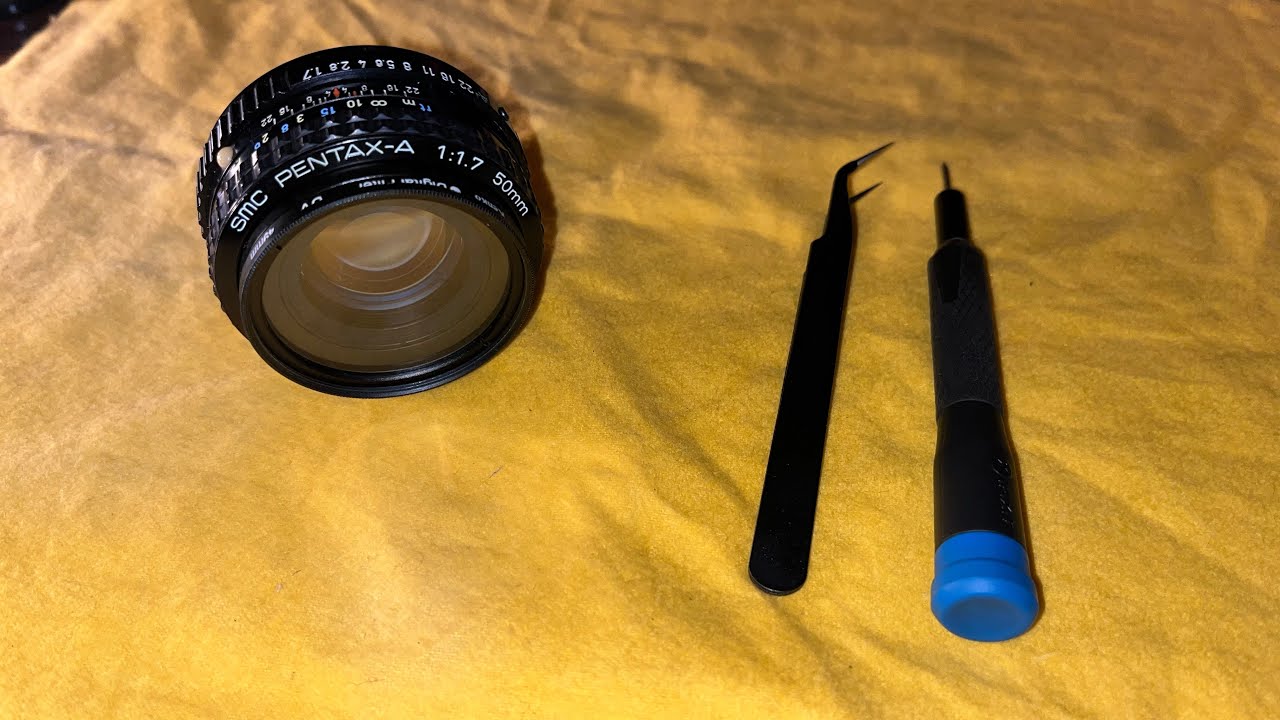 Disassembling and repairing a stuck aperture ring of a SMC Pentax-A 50m f/1.7