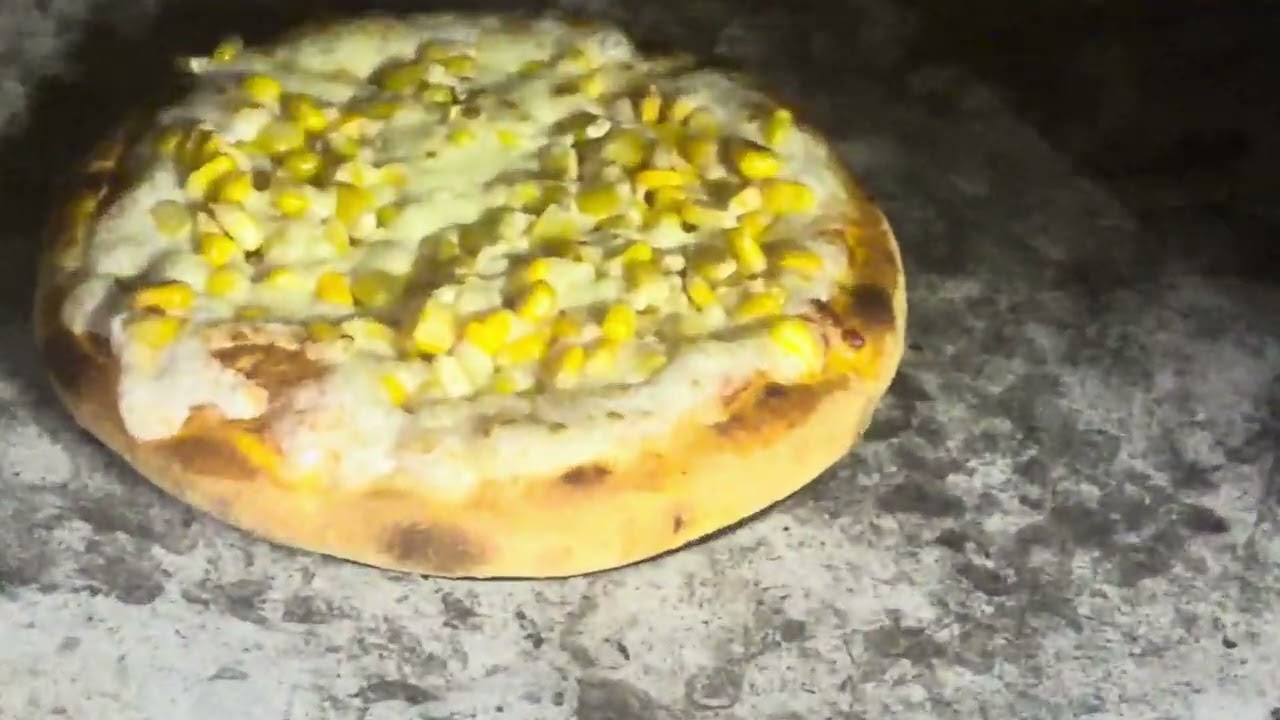 Cheesey garlic bread and corn pizza 