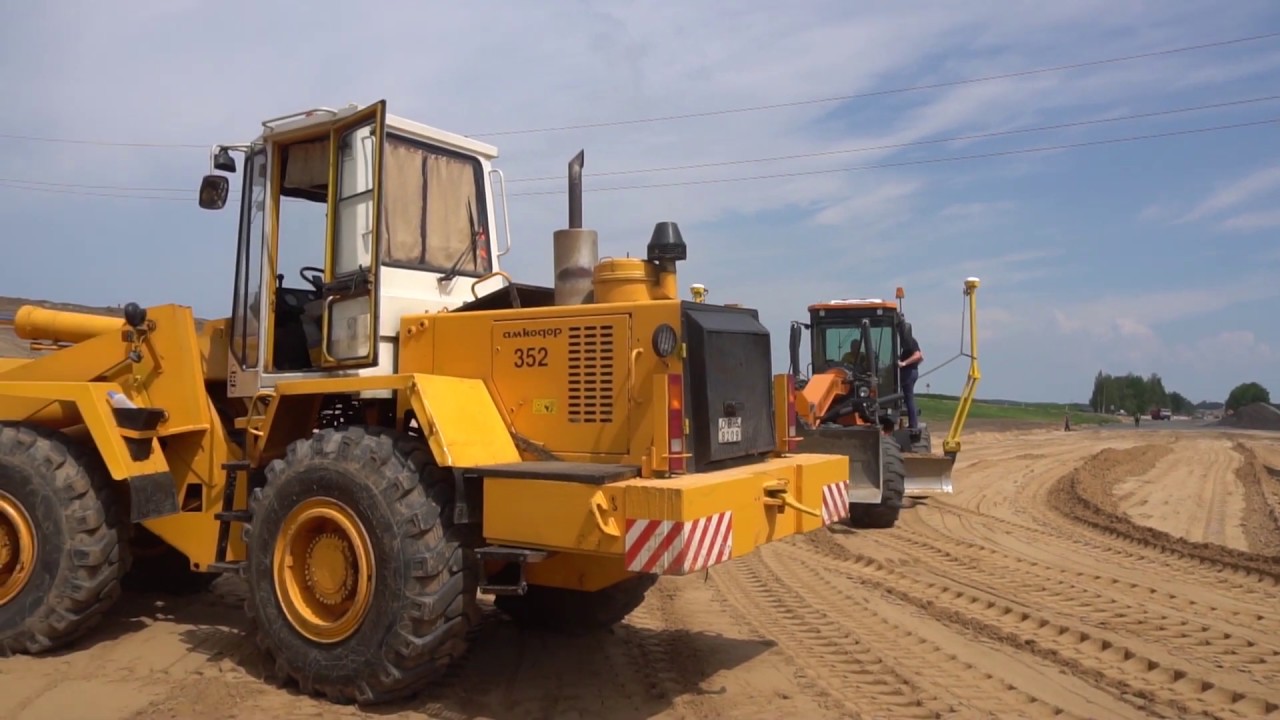 Системы автоматического нивелирования Trimble 3D в дорожном строительстве: установка и работа