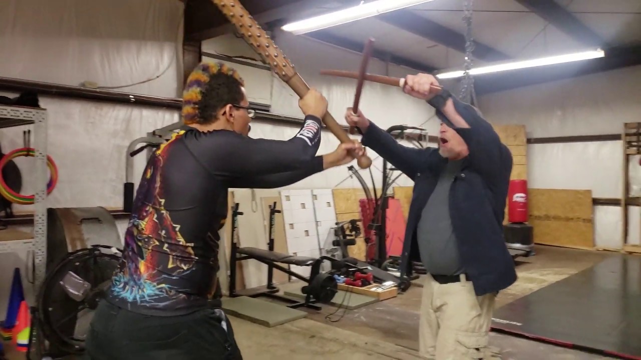 Rory Miller plays with Ben Kennedy and his kanabo #2 of 2