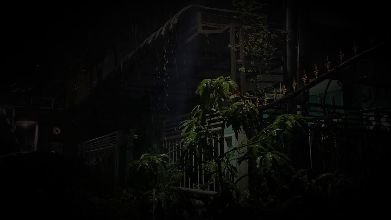 Night Rain Falling Outside a Quiet Home 🌧️