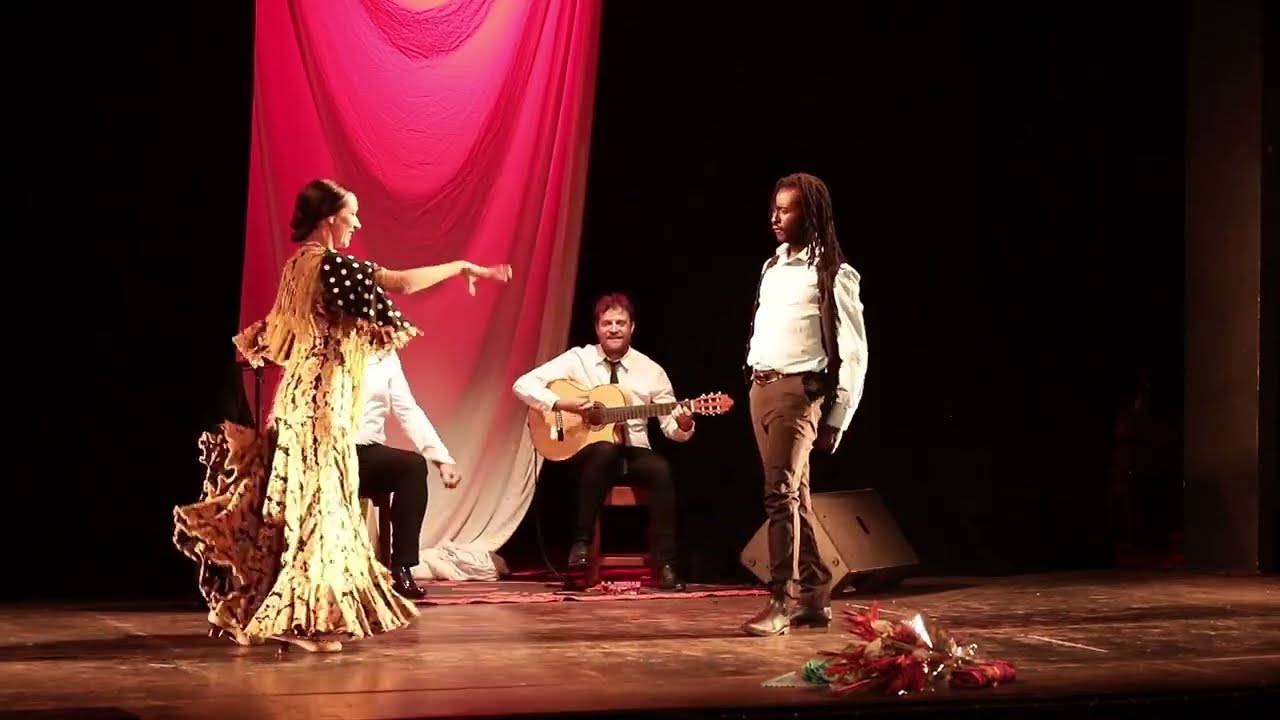Sevillanas Banderas Kouam y Anabel Veloso