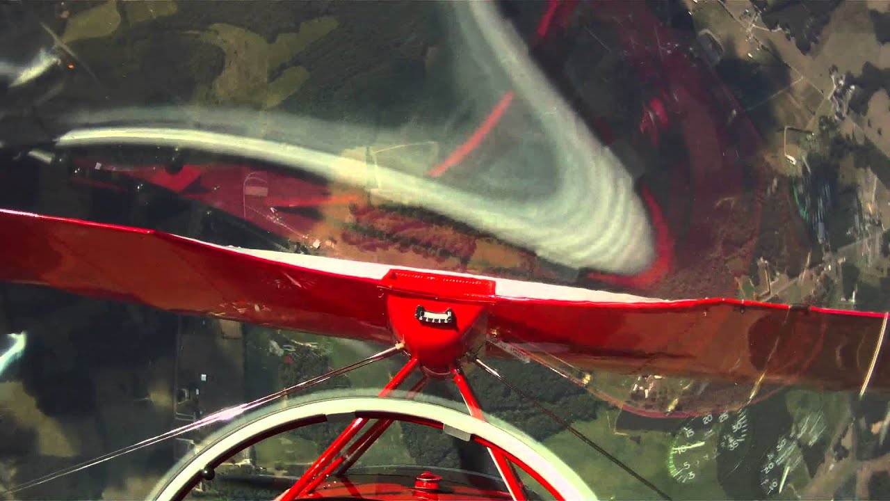 Pitts S2B aerobatic flight with spins, tumbles and other aerobatic maneuvers