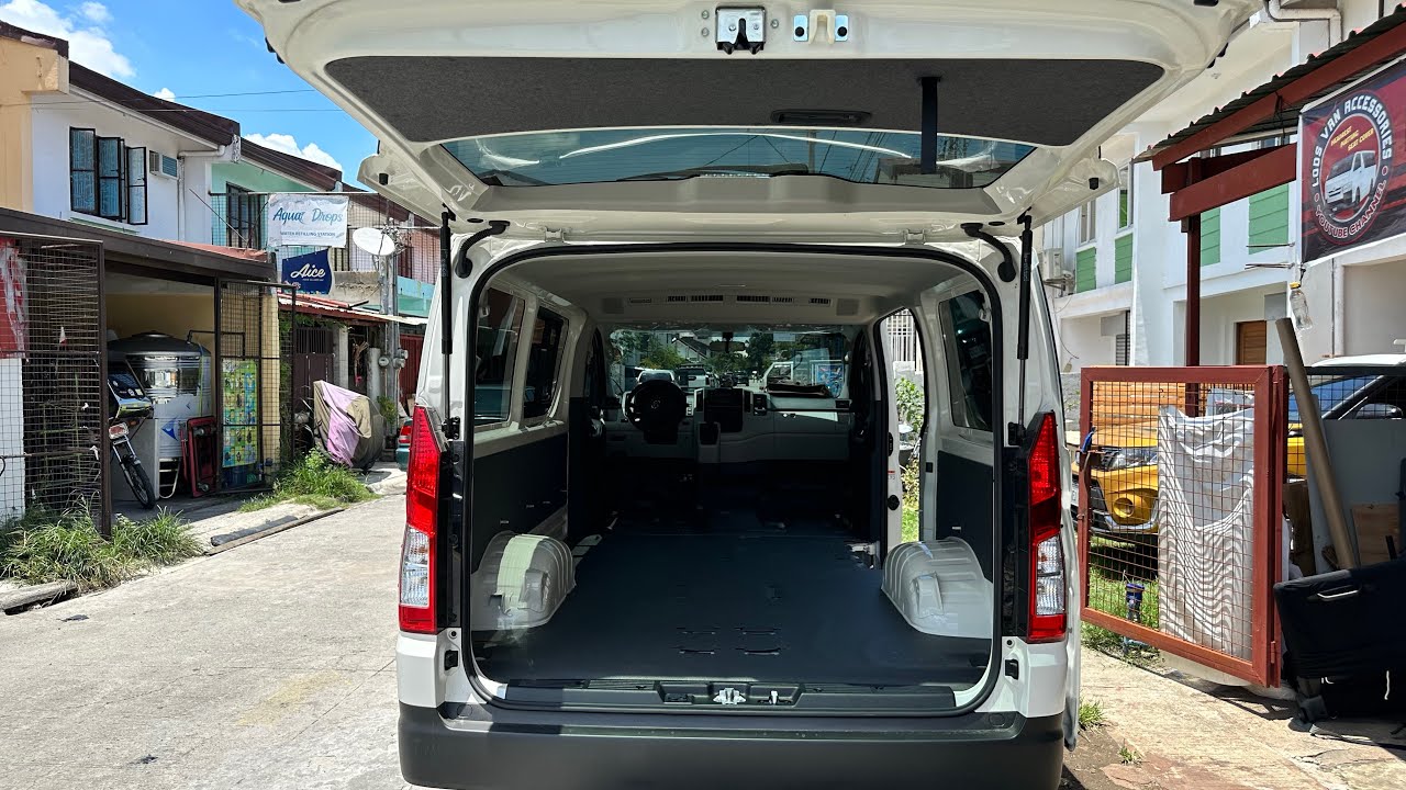Toyota Hiace commuter deluxe change matting and headrest installation