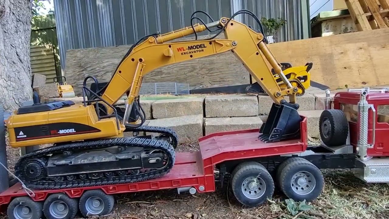 Remote Control Excavator and Bruder Mack Granite Low Loader working Aussie RC Construction style.