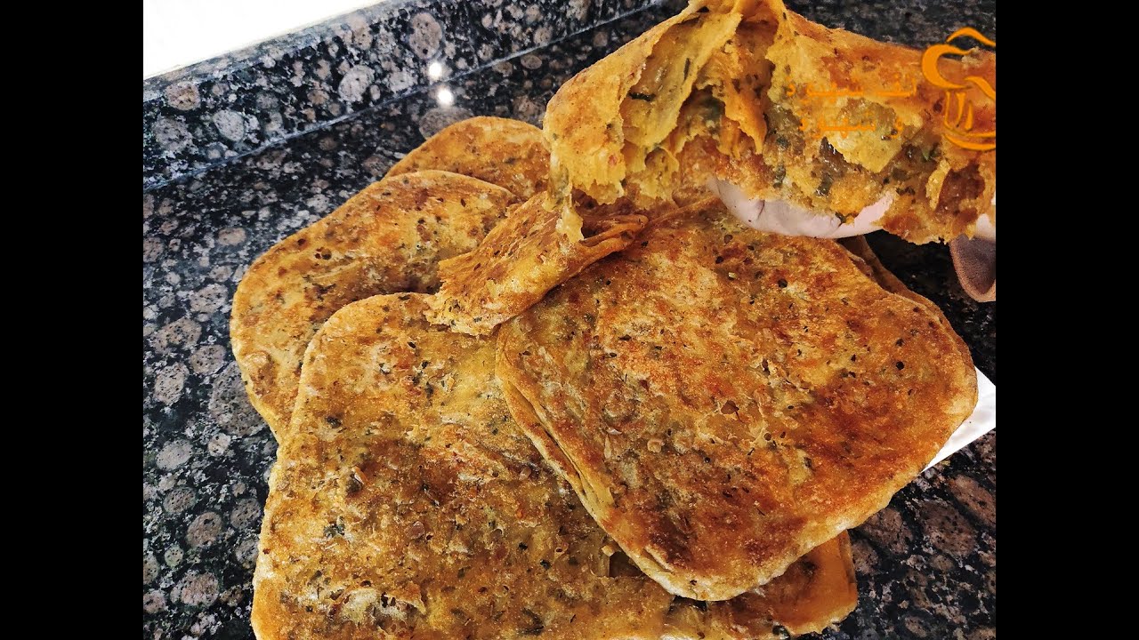 مسمن البصلة المعروف بمسمن الشحمة و لكن بلا شحمة خطييير ما غاديش يخطاكم في مائدة رمضان