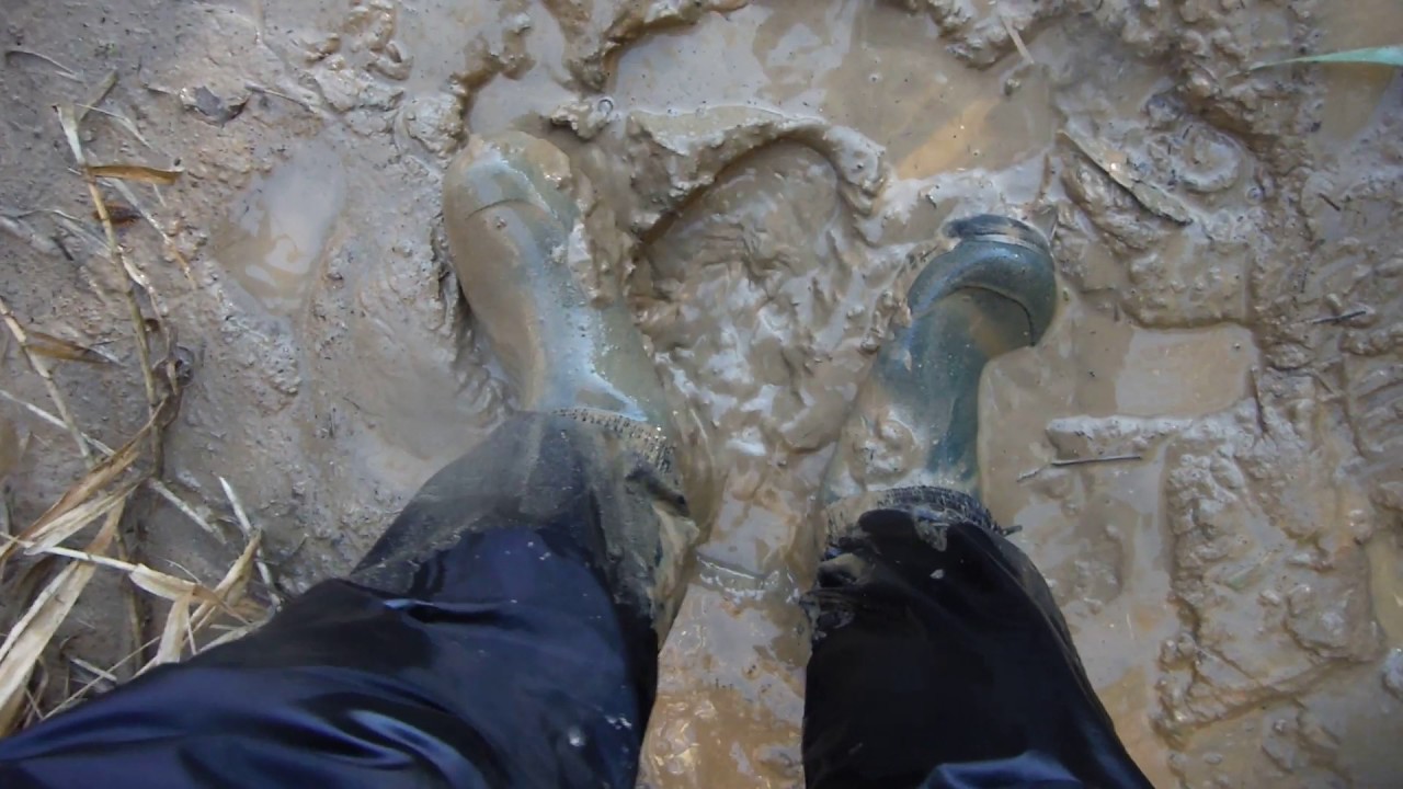 Adidas rain gear in muddy river bank 1