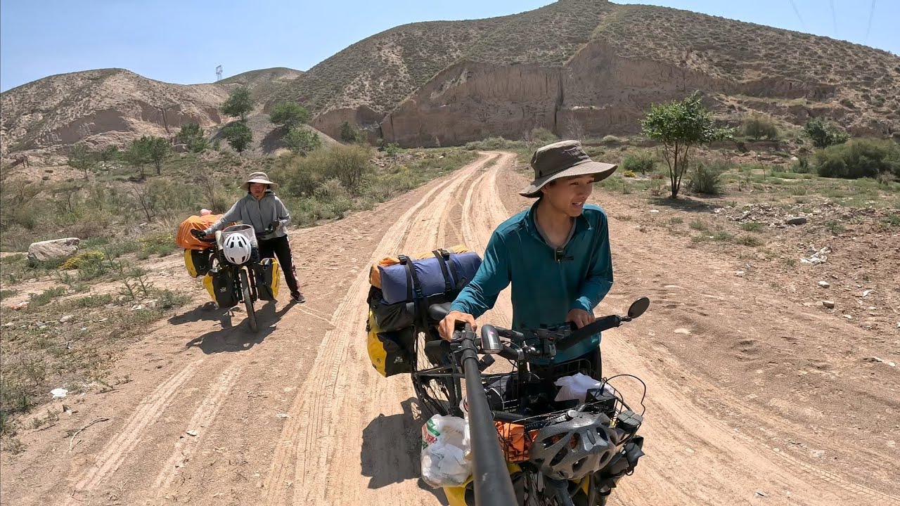 帶著媳婦騎行甘肅，下山途中遭遇爆胎，無奈只好搭車前往蘭州城【周億發的旅行】
