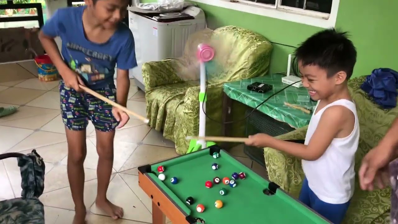They are super happy and excited to their new toy which is billiards