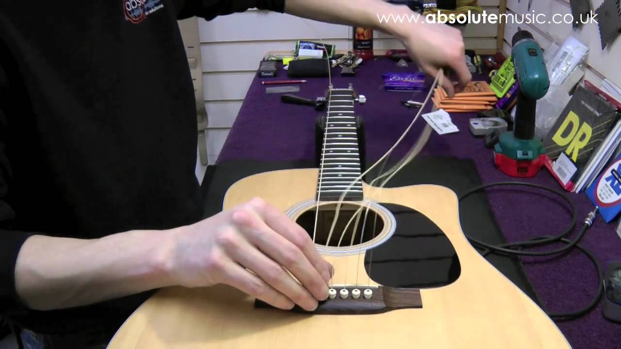 Absolute Music : Acoustic re-stringing tutorial