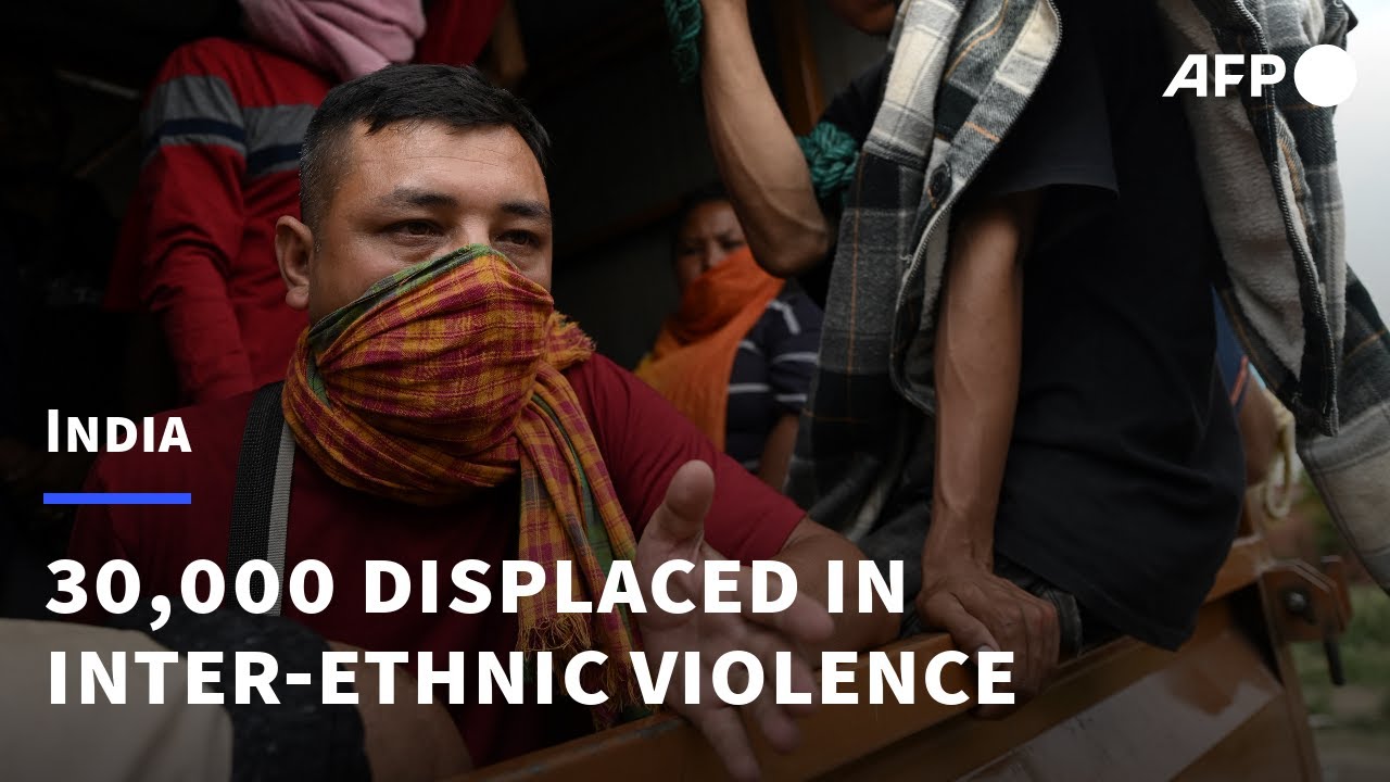 Indian ethnic clashes shatter harmony and houses | AFP