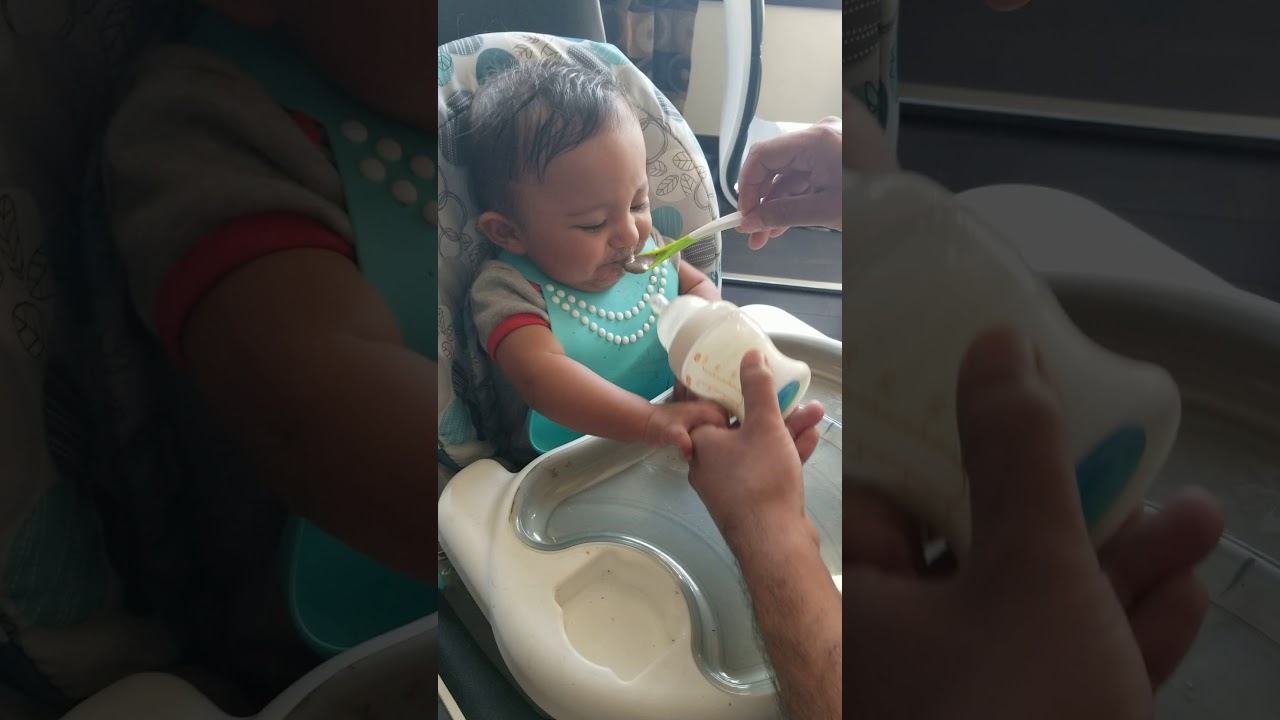 Dad tricking baby into eating Solids 😂😀😆