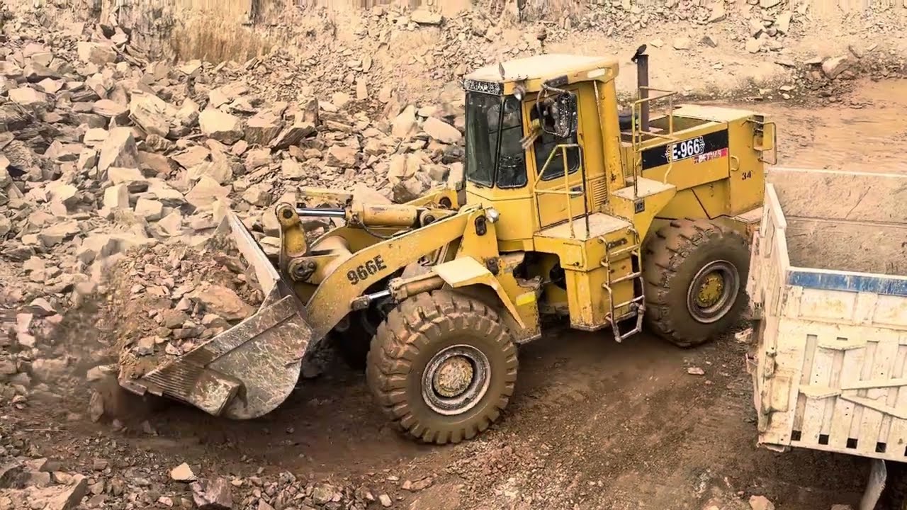 D966 Caterpillar Loader loading Stone in mountain into bigger Trolley: #mountainlife 