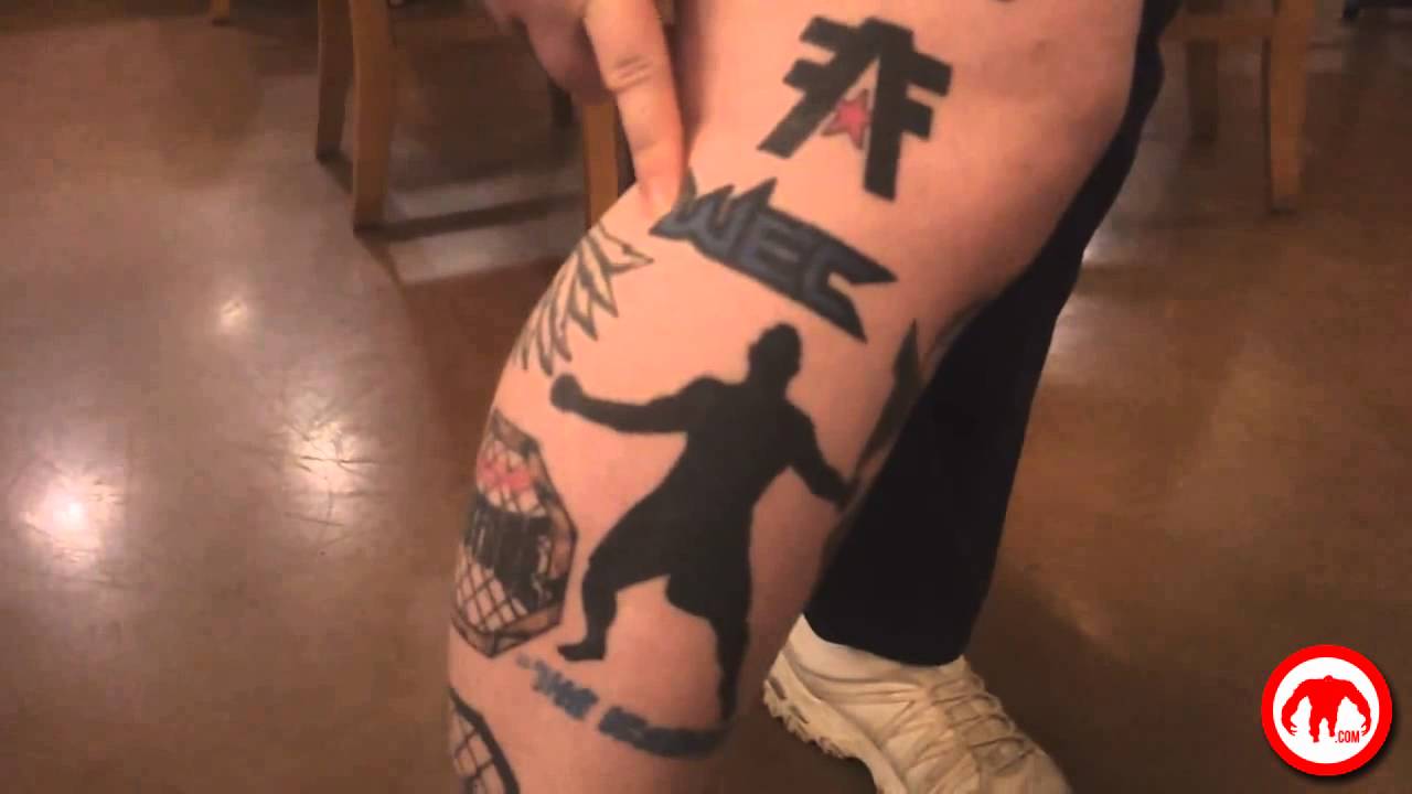 This chick has more MMA logo tattoos than a fight banner, check her out...