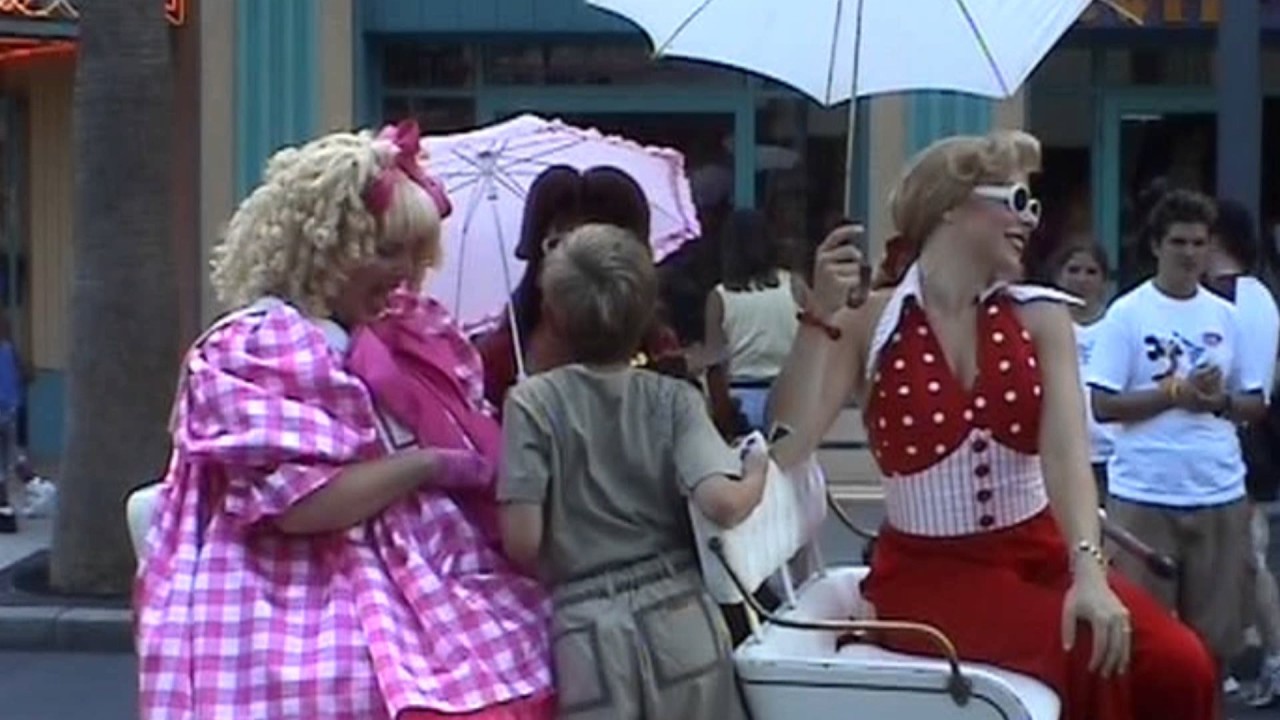 Getting kisses from Dainty Debbie and her friends ~ MGM Studios ~ Disney World - August 2004
