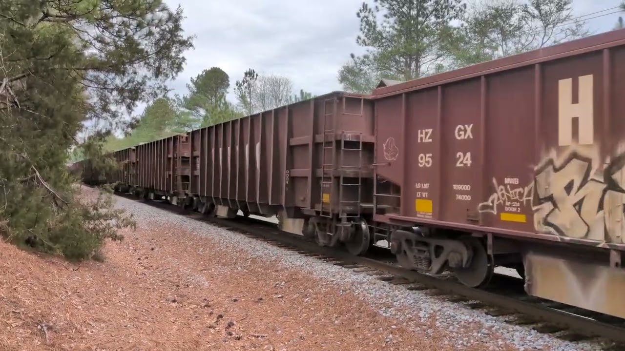 CSX 7238 and CSX 770 lead a loaded HERZOG ballast/rock train south bound Thursday 1/22/2026