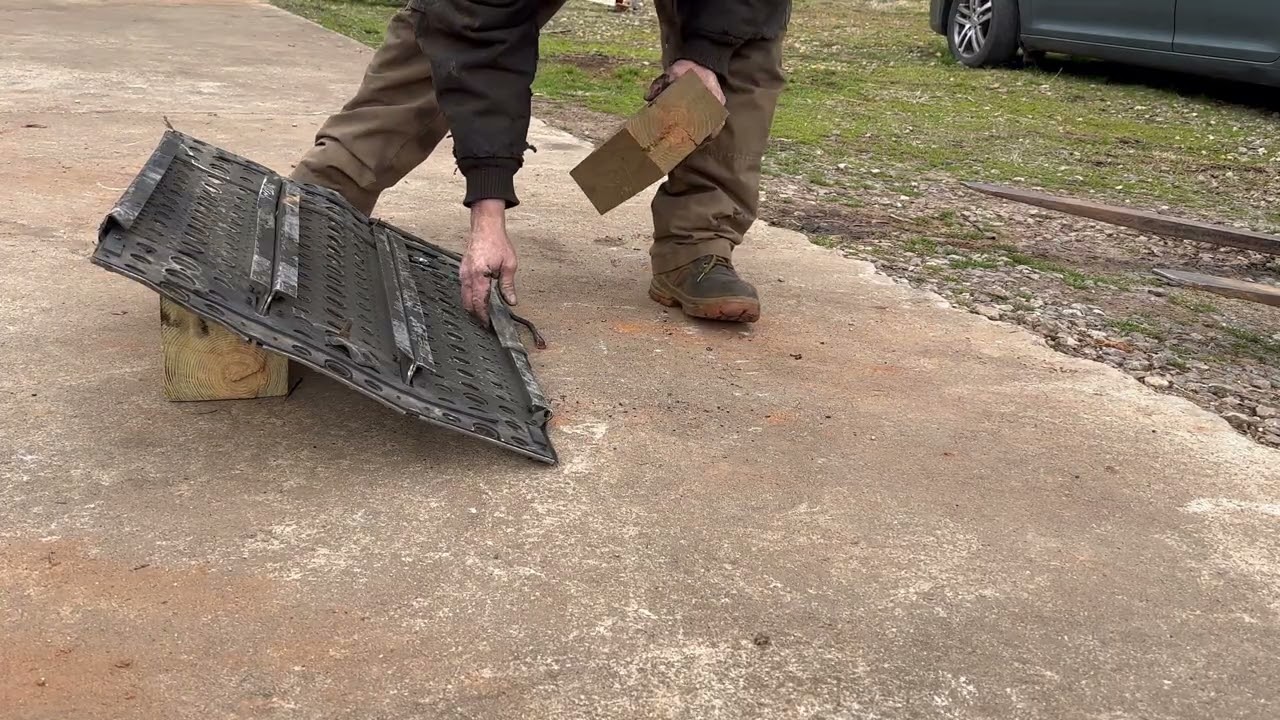 Using a skid steer to do body work