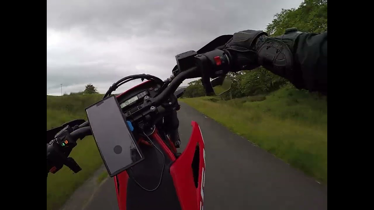 English country lanes on a Gasgas sm700, with the odd wheelie.