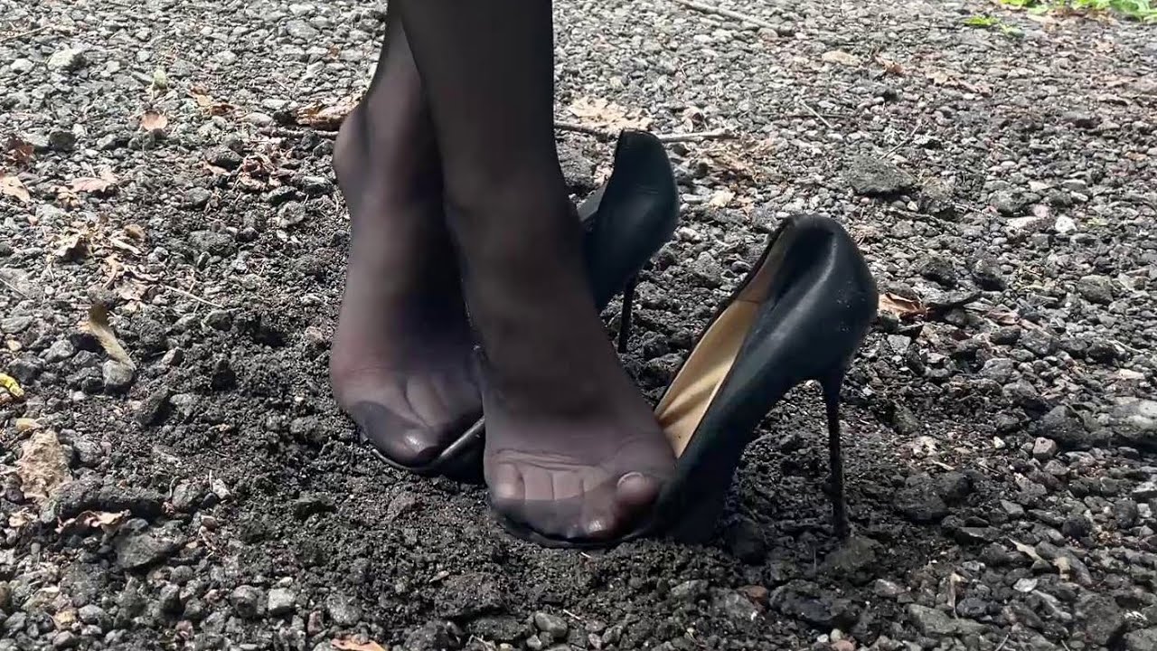 High heels stomping by feet, high heels on gravel, high heels sinking in ground, stilettos (# 1614)