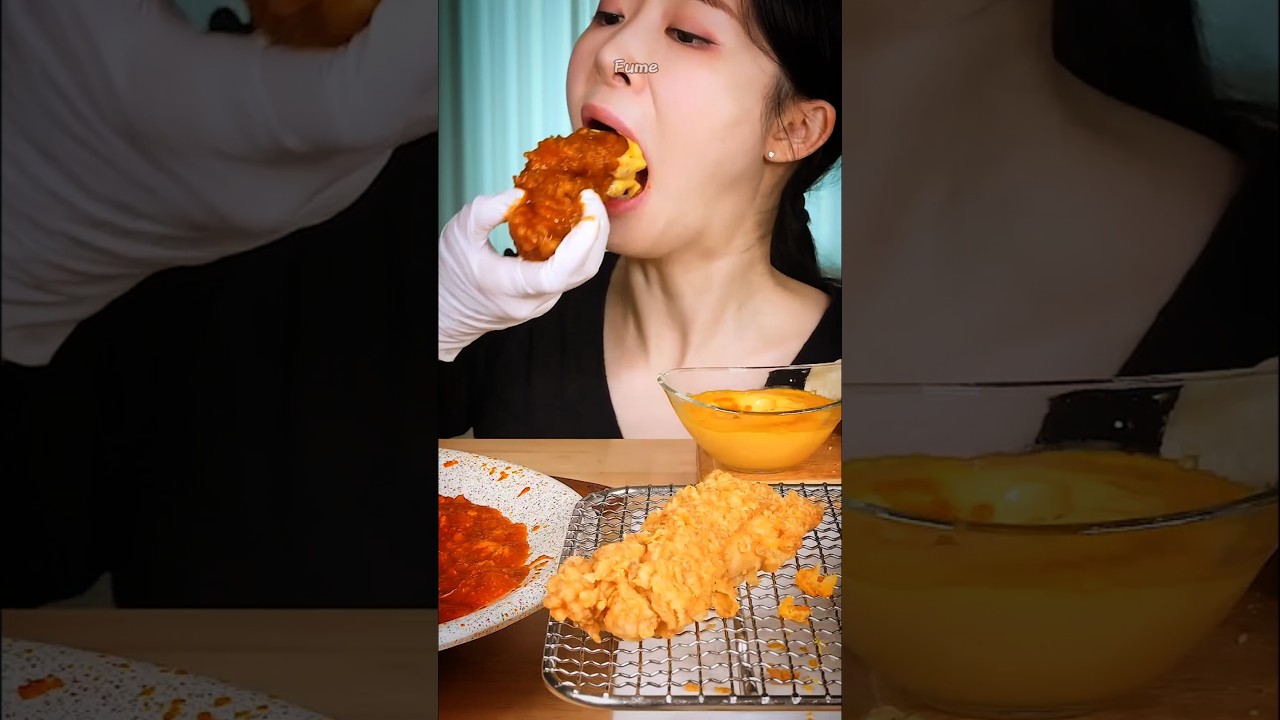 EATING SPICY CRISPY FRIED CHICKEN WITH CHEESE SAUCE 