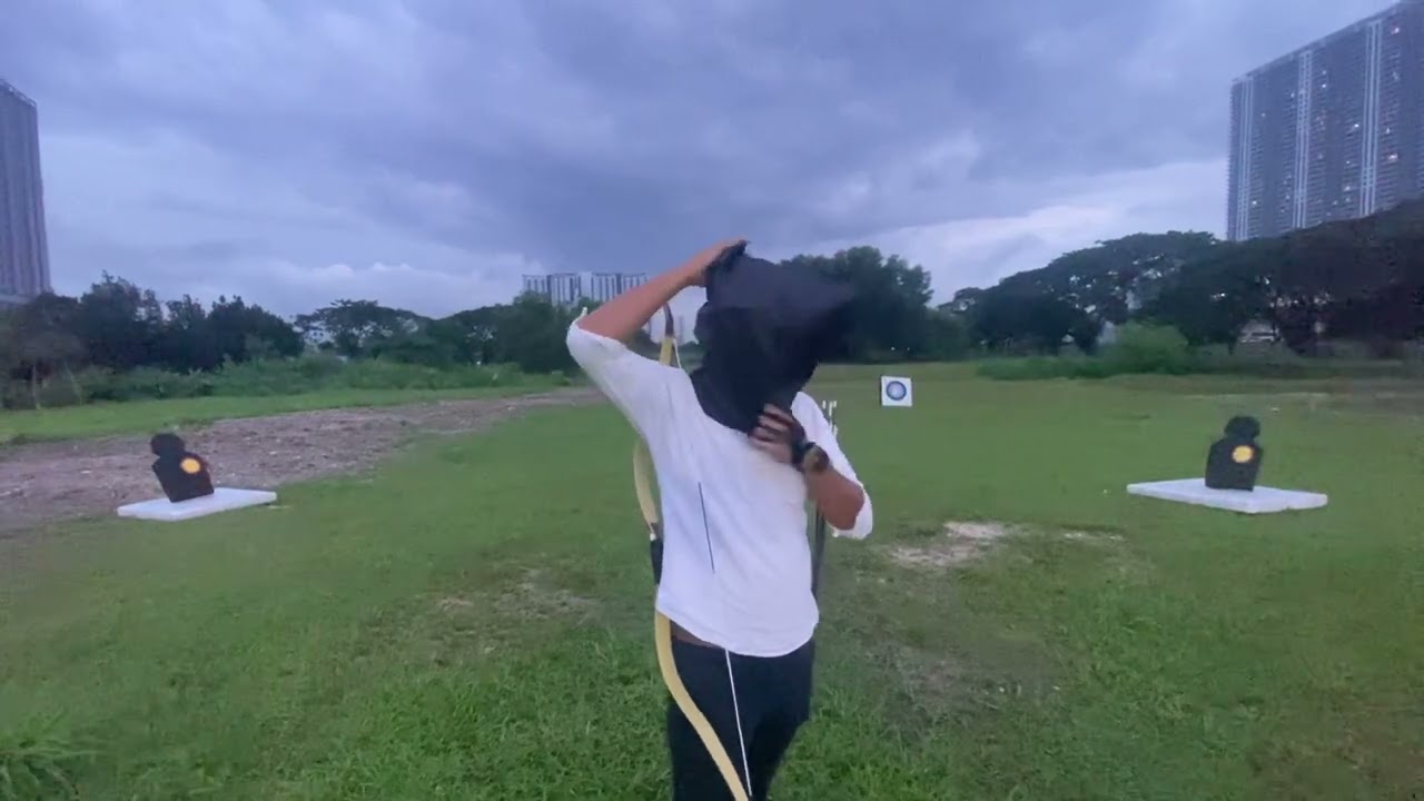 Blindfold archery trick shot - dynamic shooting multiple positions