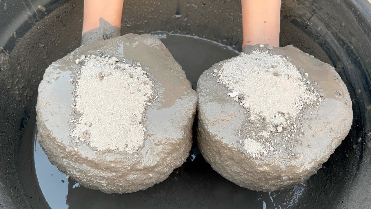 Dusty water crumbling white concrete sand cement 
