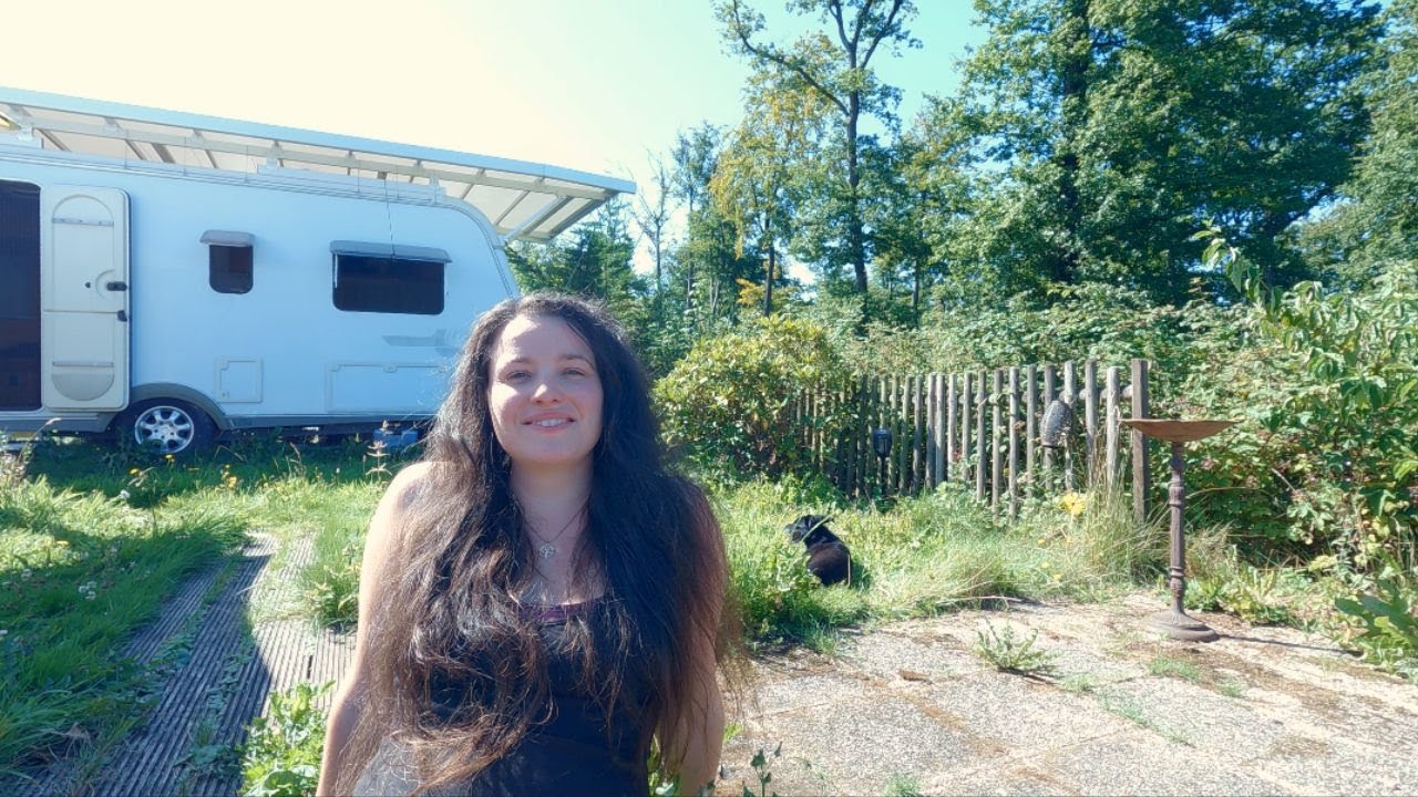 August living in a Camper by the Woods