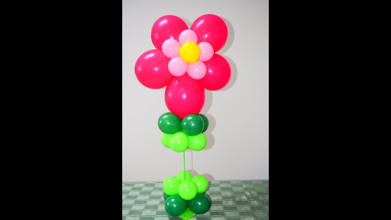 Easy Flower balloon tutorial. How to make beautiful
balloon decorations.