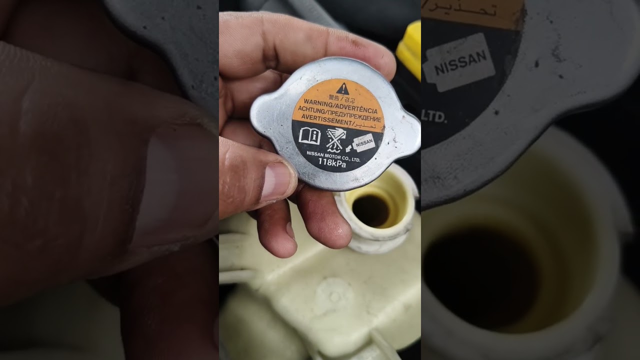 ubicaci&oacute;n de los tapones de radiador y dep&oacute;sito de compensaci&oacute;n de Nissan frontier NP300 Diesel