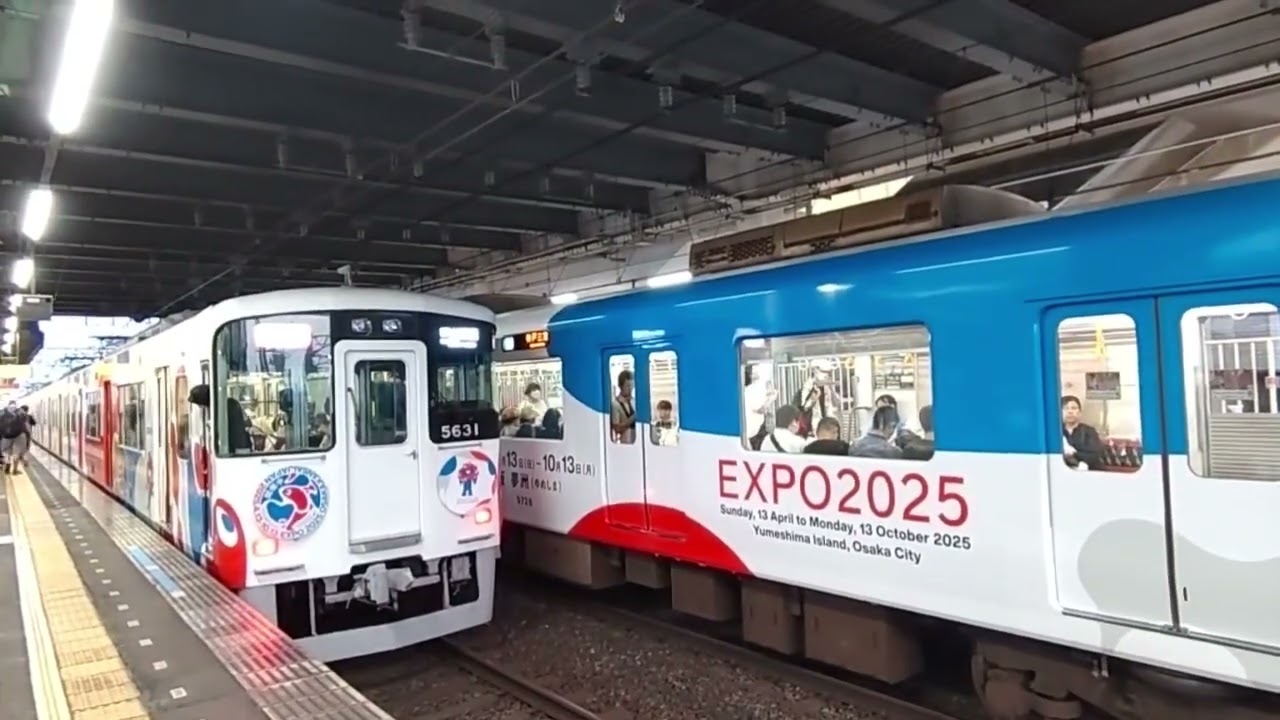 今ではもう見ることができなくなった。山陽5030系の万博ラッピング車両と近鉄9020系の万博ラッピング車両が同時に魚崎駅に到着(大ちゃん、撮影)