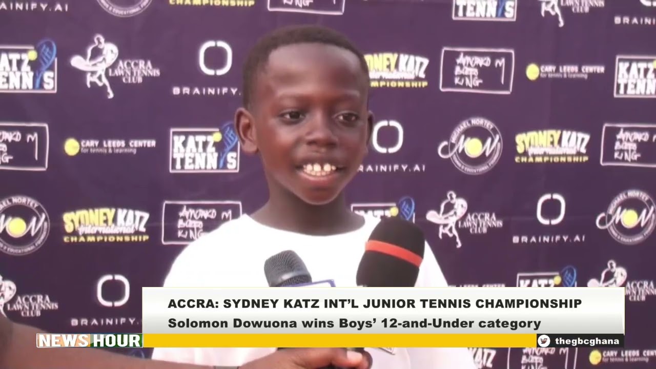 ACCRA: SOLOMON DOWUONA AND HILTON ASHITEY LIFT SYDNEY KATZ INTER JUNIOR TENNIS CHAMPIONSHIP TROPHIES