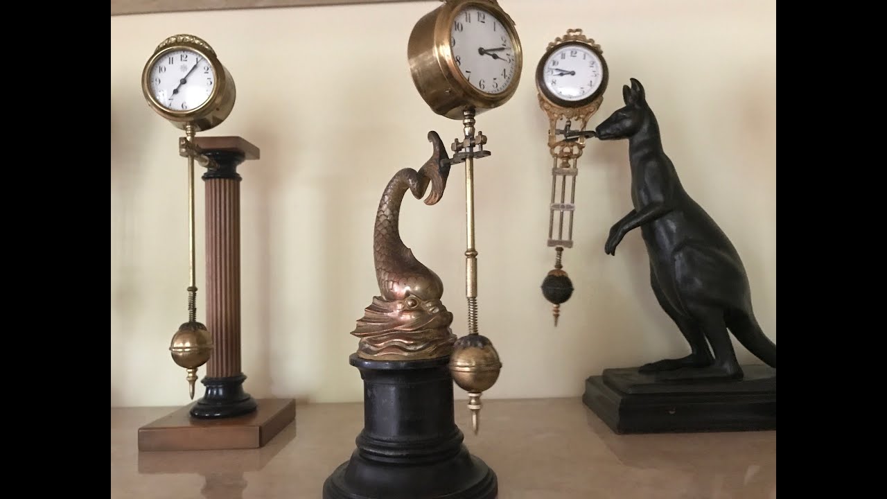 JUNGHANS   mystery clock, mysterieuse uhren, kiwak, swinger clock