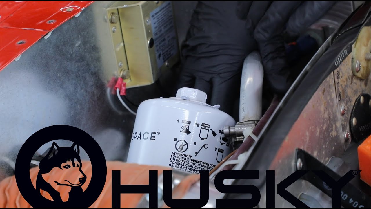 Husky Oil Change at the Aviat Aircraft Factory