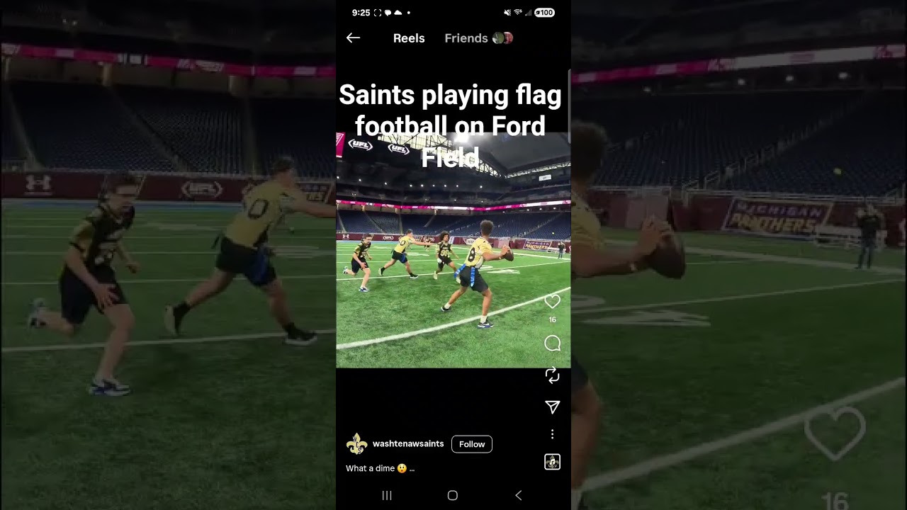 Saints playing flag football on Ford Field