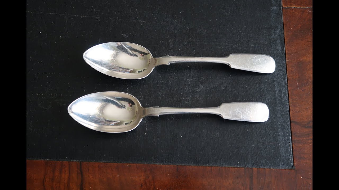 A pair of Russian 84 zolotnik silver serving spoons