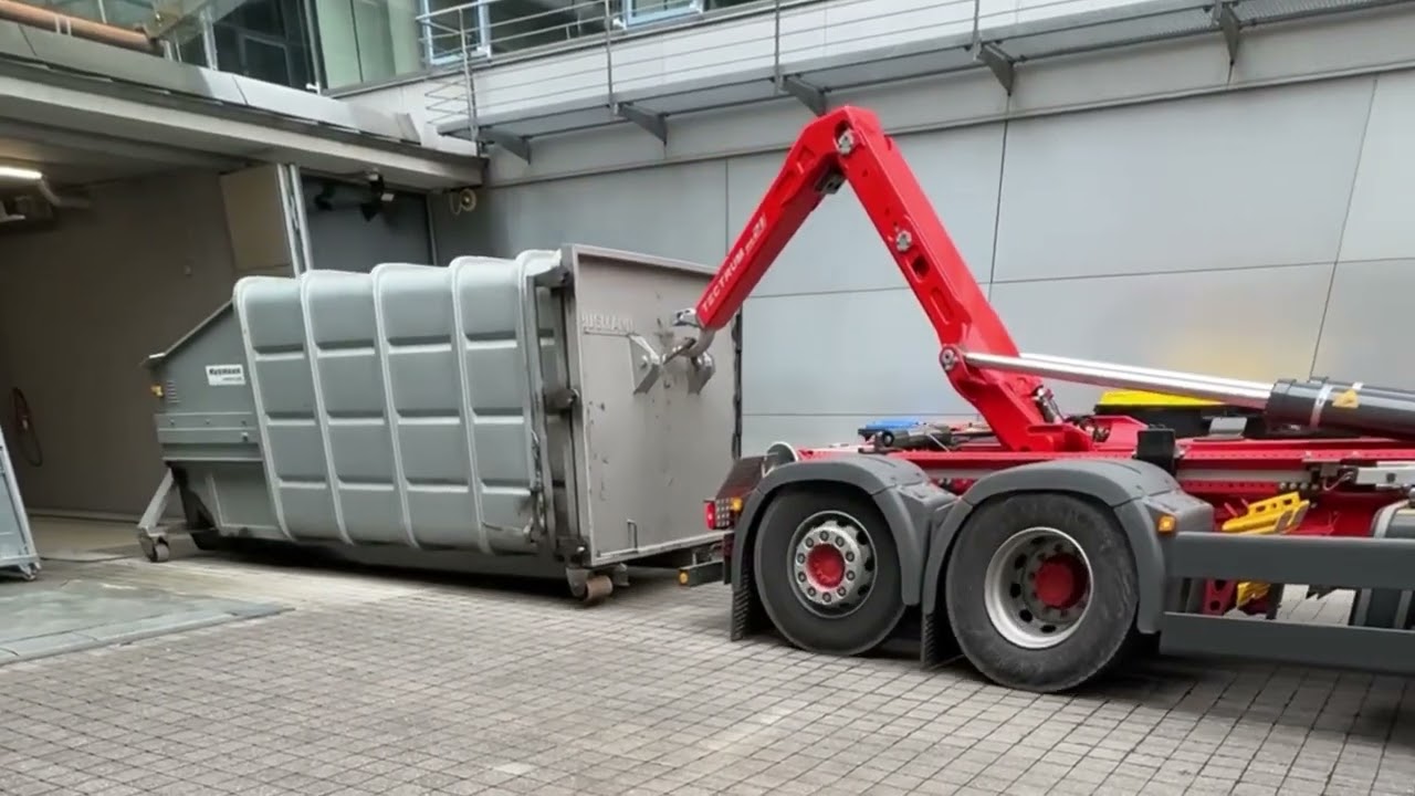 How to load a container onto a vehicle