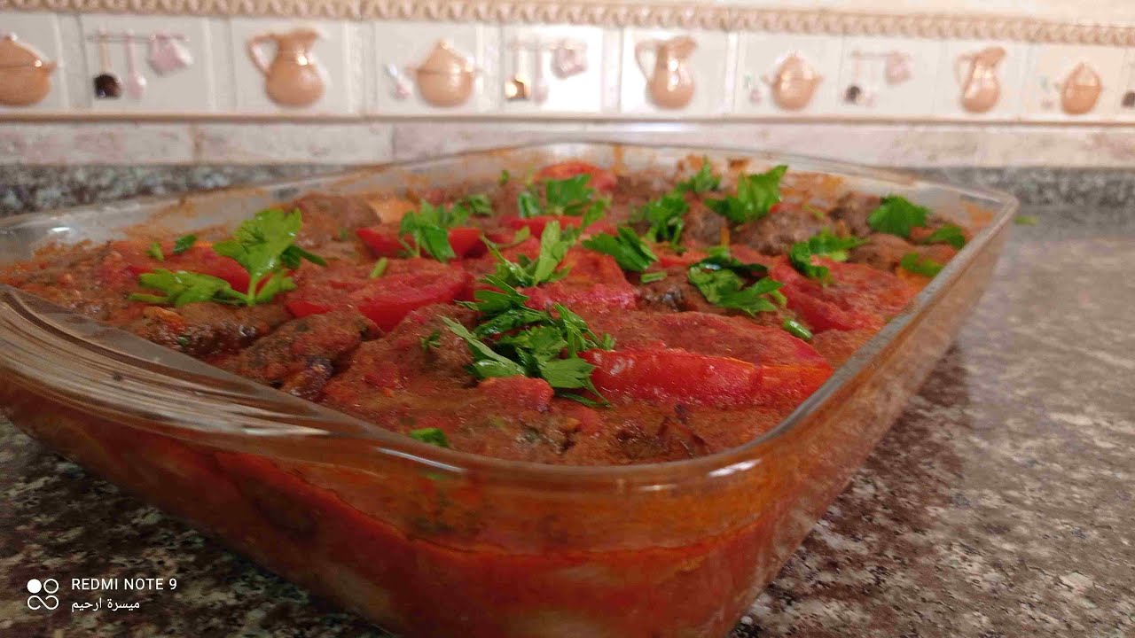 Delicious potato tray with minced meat and tomato sauce