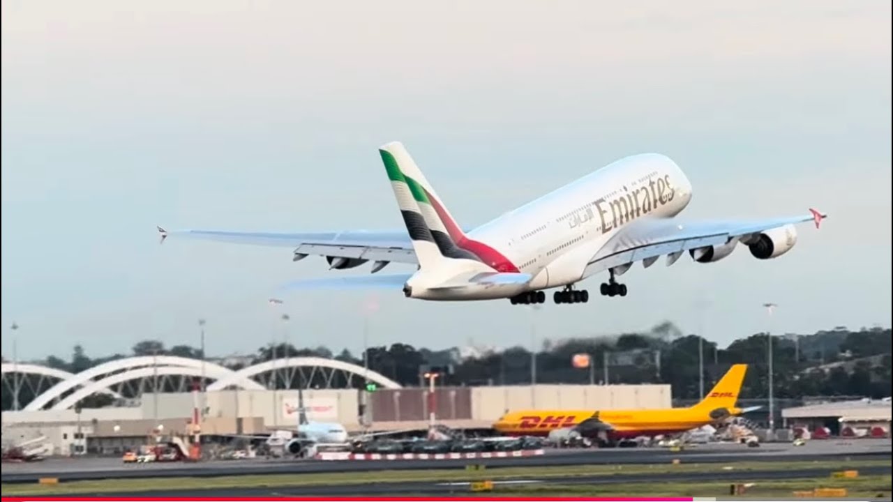 Emirates A380-861 (New livery) & Fiji B737 Max-8 depart YSSY 34L. Qantas & CZ B787-9 arrives