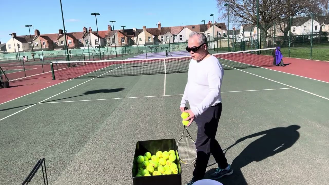 Salas plays with ball machine